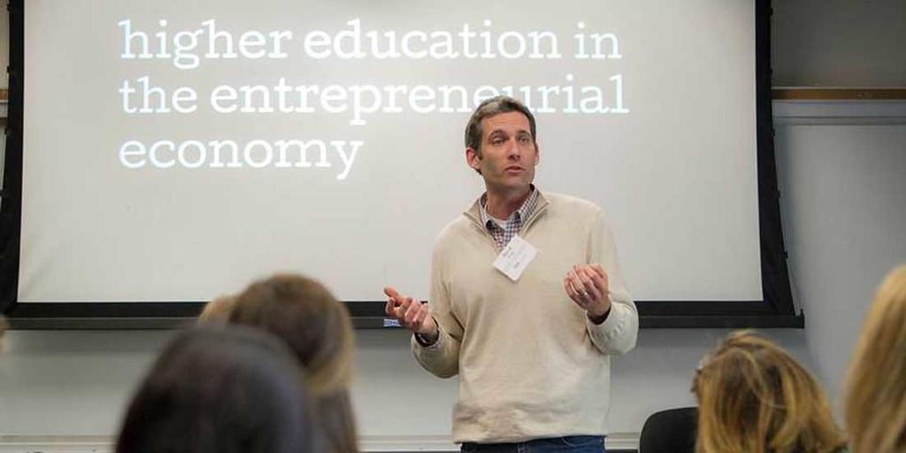 David Miller speaking to audience